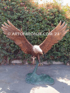 Thunder and Lightning heroic bronze eagle statue anchored to a bronze base and branch