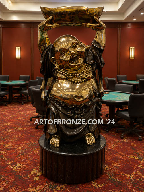 Commerce Casino custom created laughing buddha bronze statue holding vessel of fortune