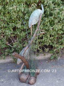 Mashland Waders lost wax casting of two heron cranes resting on branch at tranquil residence