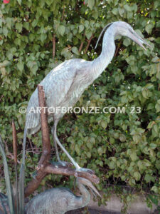 Mashland Waders lost wax casting of two heron cranes resting on branch at tranquil residence