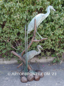 Mashland Waders lost wax casting of two heron cranes resting on branch at tranquil residence