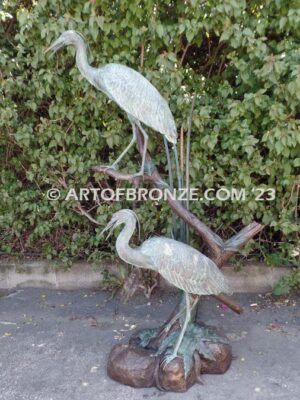 Mashland Waders lost wax casting of two heron cranes resting on branch at tranquil residence