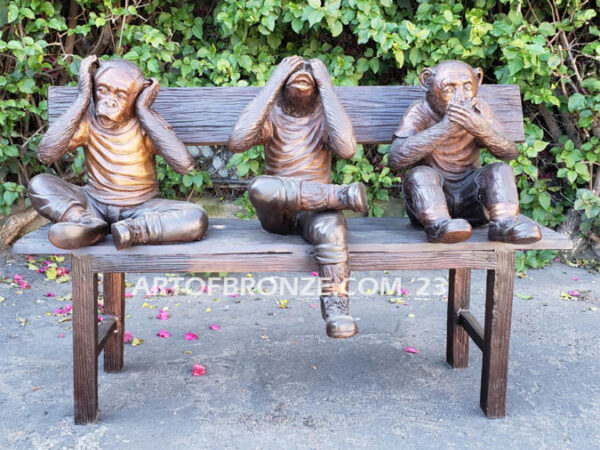 Hear See Speak No Evil special edition bronze statue of monkeys sitting on bench