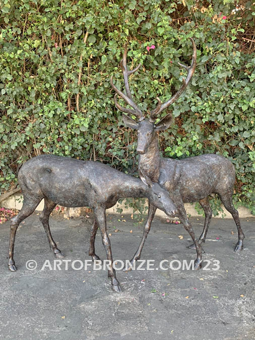 Field of Dreams outdoor monumental bronze buck and doe pair standing sculptures