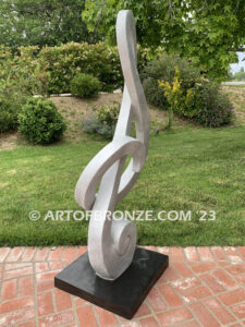 Signature of Time bronze sculpture of monumental Treble Clef musical note