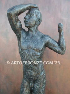 Age of Bronze figurative bronze statue of nude male with tightened musculature and twisting body