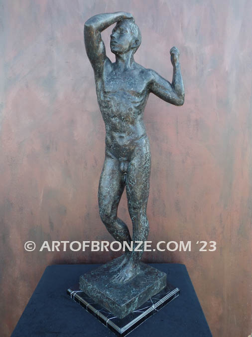 Age of Bronze figurative bronze statue of nude male with tightened musculature and twisting body
