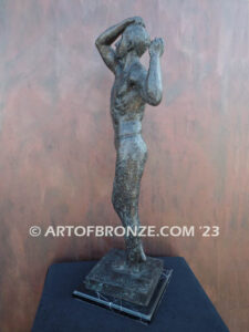 Age of Bronze figurative bronze statue of nude male with tightened musculature and twisting body