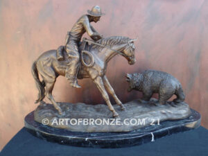 Fighting Chance bronze statue cowboy-on-horseback-encountering-a-wild-bear