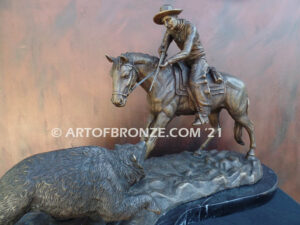 Fighting Chance bronze statue cowboy-on-horseback-encountering-a-wild-bear