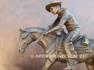 Fighting Chance bronze statue cowboy-on-horseback-encountering-a-wild-bear