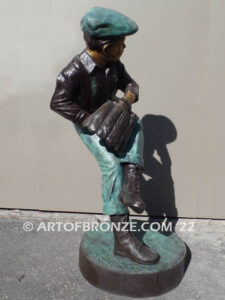 Pitching Ace Outdoor bronze sculpture of baseball pitcher in windup