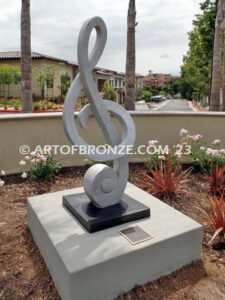 Signature of Time bronze sculpture of monumental Treble Clef musical note for Cogir Senior Living Center in Brea, CA