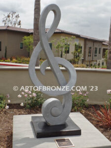 Signature of Time bronze sculpture of monumental Treble Clef musical note for Cogir Senior Living Center in Brea, CA