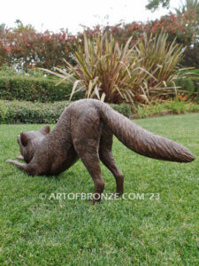 Alert bronze stretching fox mascot sculpture for gallery, art in public places or school