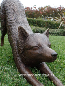 Alert bronze stretching fox mascot sculpture for gallery, art in public places or school