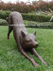 Alert bronze stretching fox mascot sculpture for gallery, art in public places or school