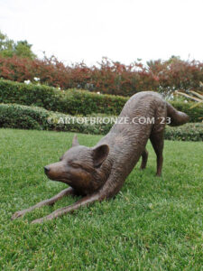 Alert bronze stretching fox mascot sculpture for gallery, art in public places or school