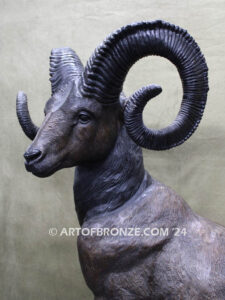 Big Horn Majesty monumental outdoor bronze sculpture ram on bronze rock ledge