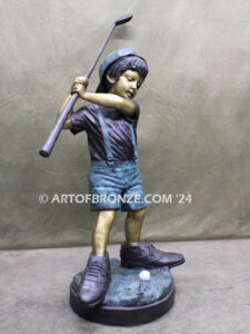 In My Fathers Shoes bronze sports statue of budding golfer boy hitting ball