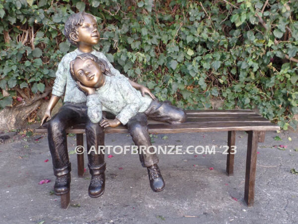 Cherished Moments bronze statue of two kids relaxing on bench