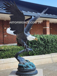 Colleyville Municipal Court Eagle of Justice outdoor monumental statue of an eagle landing atop granite pillar