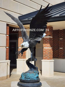 Colleyville Municipal Court Eagle of Justice outdoor monumental statue of an eagle landing atop granite pillar