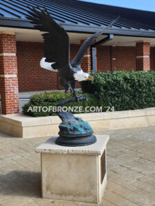 Colleyville Municipal Court Eagle of Justice outdoor monumental statue of an eagle landing atop granite pillar