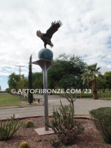 Evergreen Cemetery Veterans Memorial bronze statues of eagle on globe and boy saluting flag