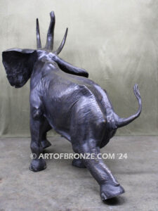 Triumphant March majestic bronze cast statue of walking elephant