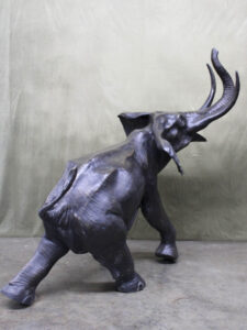 Triumphant March majestic bronze cast statue of walking elephant