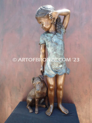 Girls Best Friend bronze sculpture of girl playing with puppy
