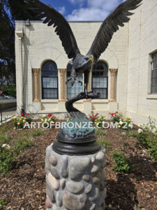 Orland Memorial Hall outdoor monumental sculpture of an eagle landing on branch