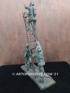 Rising bravery bronze statue of three firefighters climbing ladder battling fire