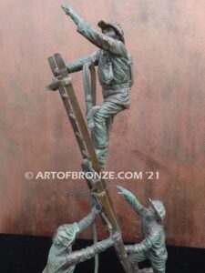 Rising bravery bronze statue of three firefighters climbing ladder battling fire