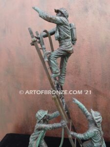 Rising bravery bronze statue of three firefighters climbing ladder battling fire