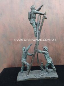 Rising bravery bronze statue of three firefighters climbing ladder battling fire