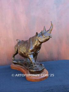 Charging black rhino high-quality bronze statue for indoor home and office display