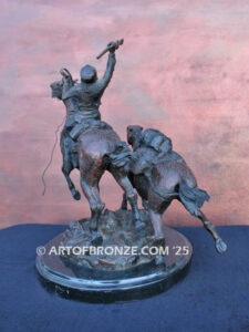Mountain man bronze statue of trapper riding on horse