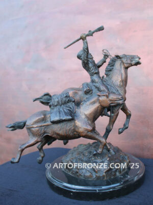 Mountain man bronze statue of trapper riding on horse