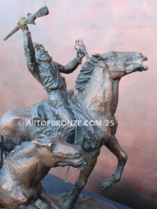 Mountain man bronze statue of trapper riding on horse
