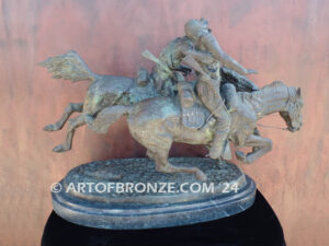 Wounded Bunkie bronze statue of two cavalry troopers on horseback after Frederic Remington
