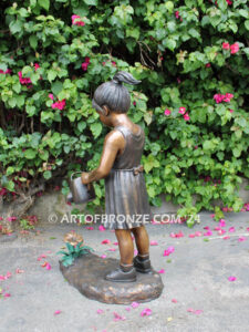 Blooming Love bronze sculpture of girl holding watering flower