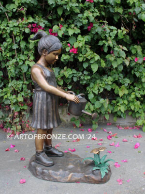 Blooming Love bronze sculpture of girl holding watering flower