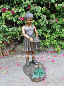 Blooming Love bronze sculpture of girl holding watering flower