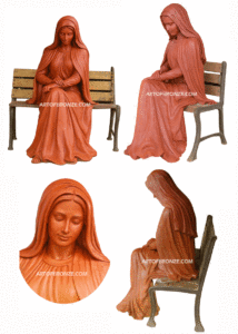 church or garden bronze statue Blessed Virgin Mary sitting on bench