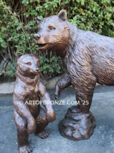 Protective Path monumental outdoor bronze statue of mother bear and cubs playing