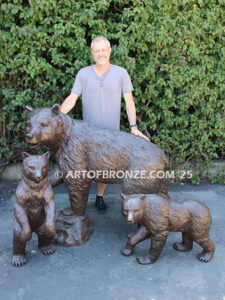 Protective Path monumental outdoor bronze statue of mother bear and cubs playing