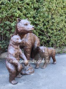 Protective Path monumental outdoor bronze statue of mother bear and cubs playing