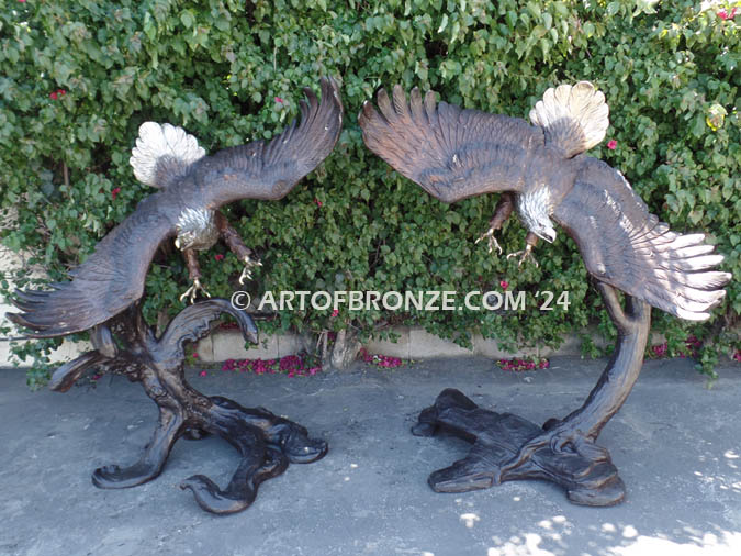 Masters of the Wind bronze sculpture of left/right pair striking bald eagles attached to bronze branch